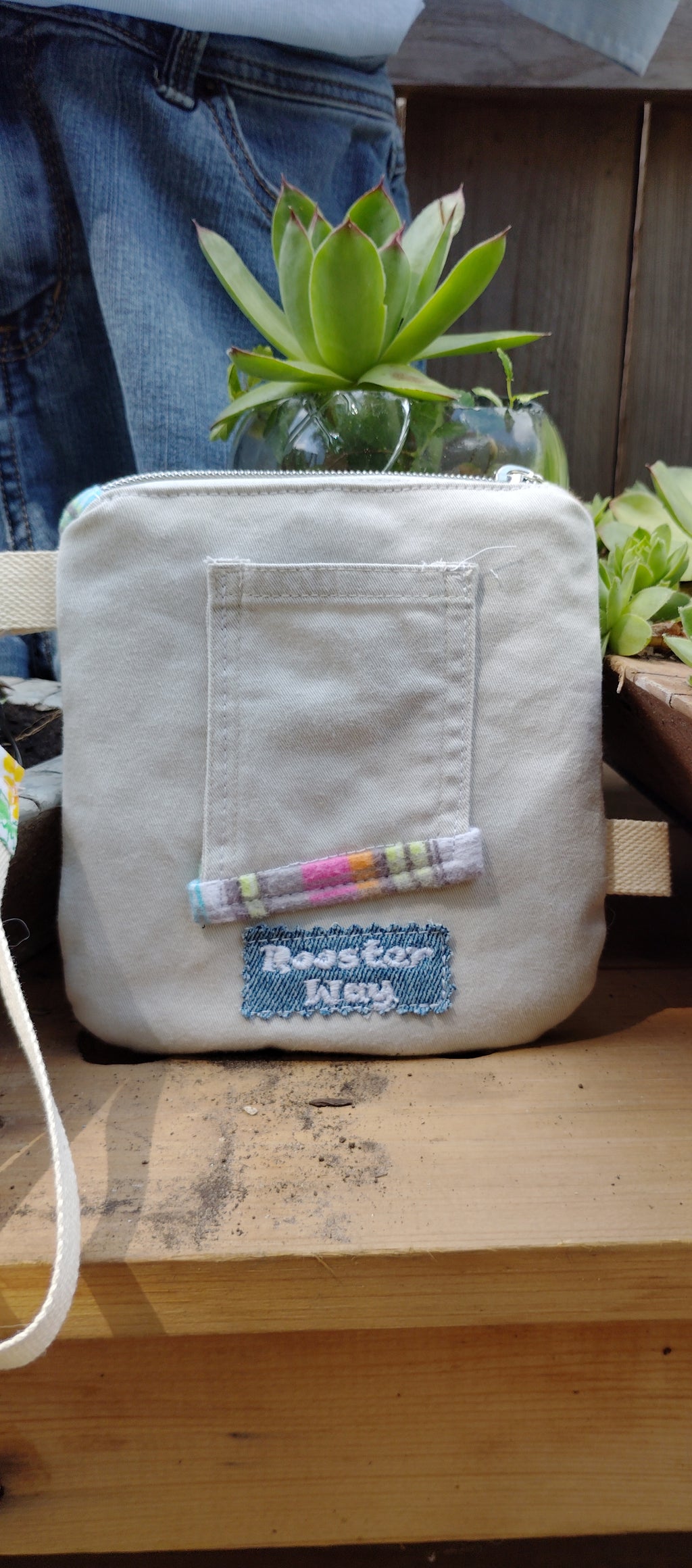 Embroidered wristlet festival flowers and face